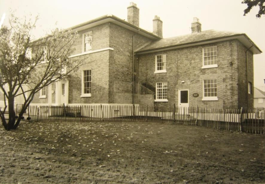 Archival photograph showing the northeast elevation and garden in 1968